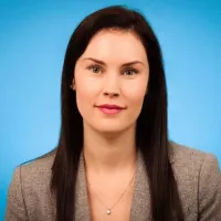 A headshot of Andrea Tricco